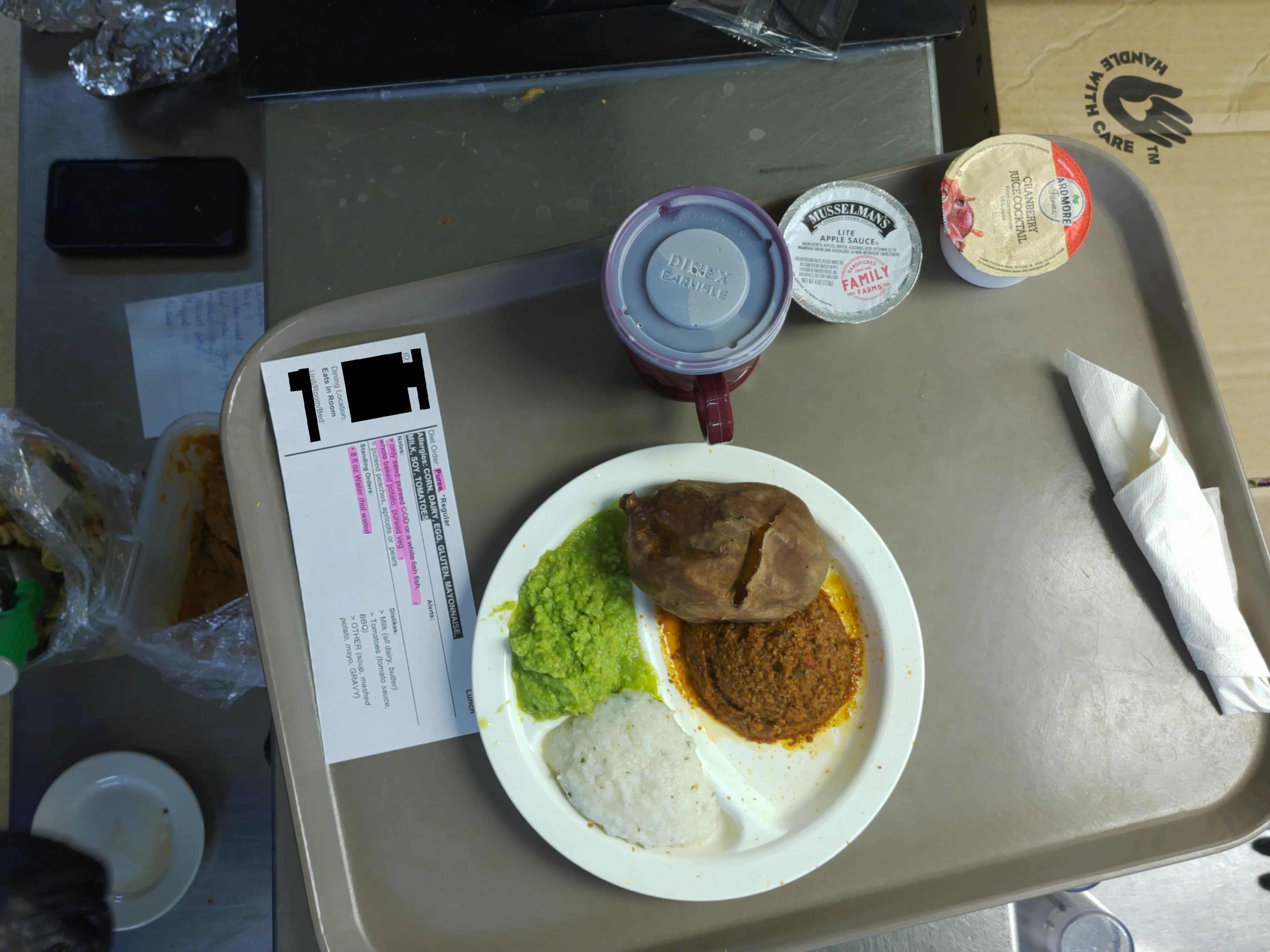 Tray photo: puree ticket, a whole baked potato, and an intact non-pureed entrée component.