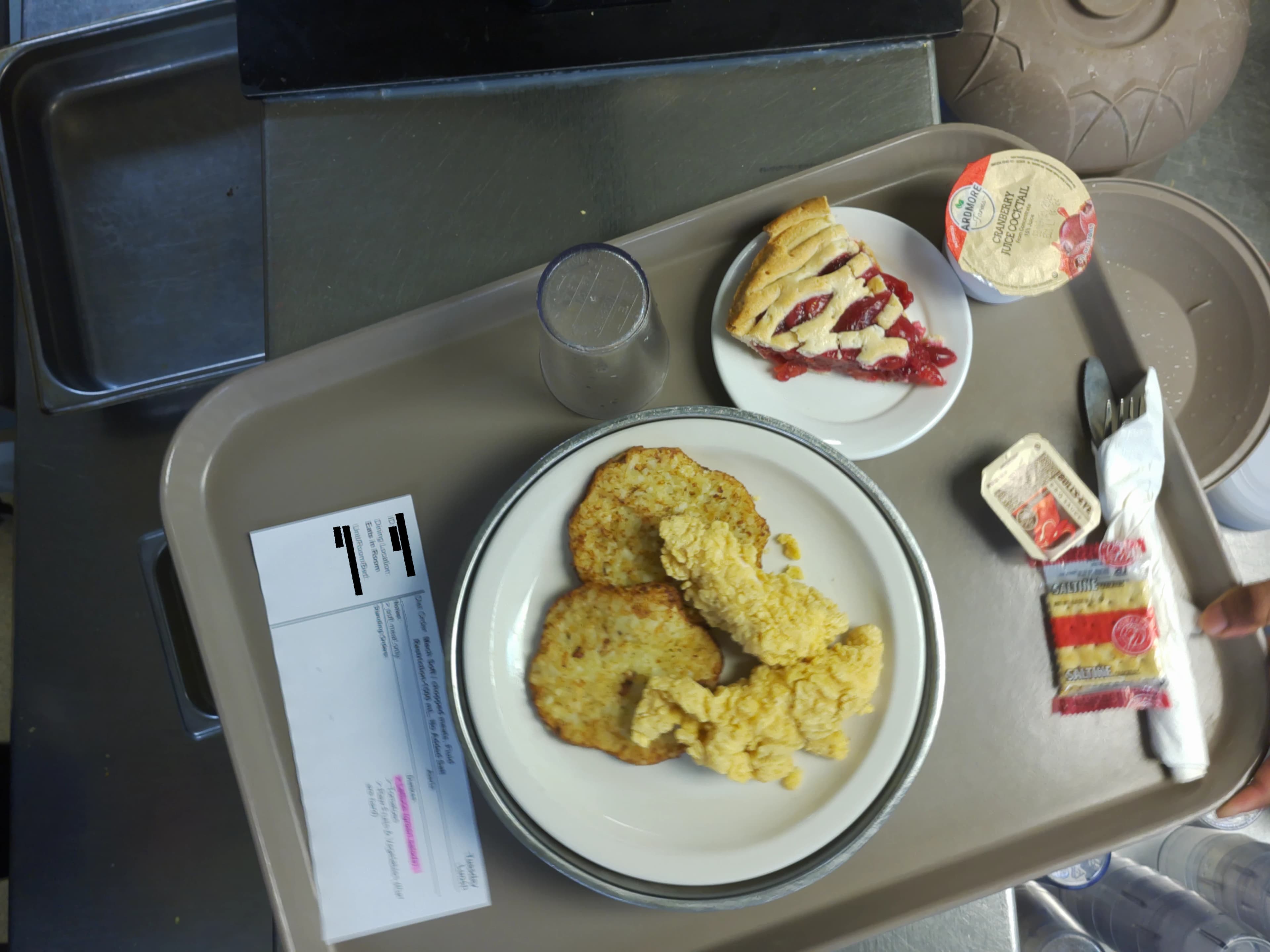 Tray photo: modified-texture ticket and whole breaded chicken tenders.